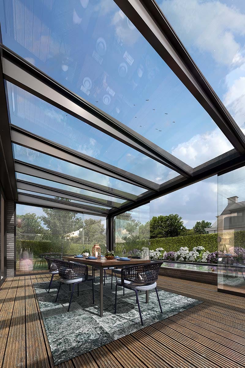Glazen tuinkamer met glazen schuifwanden