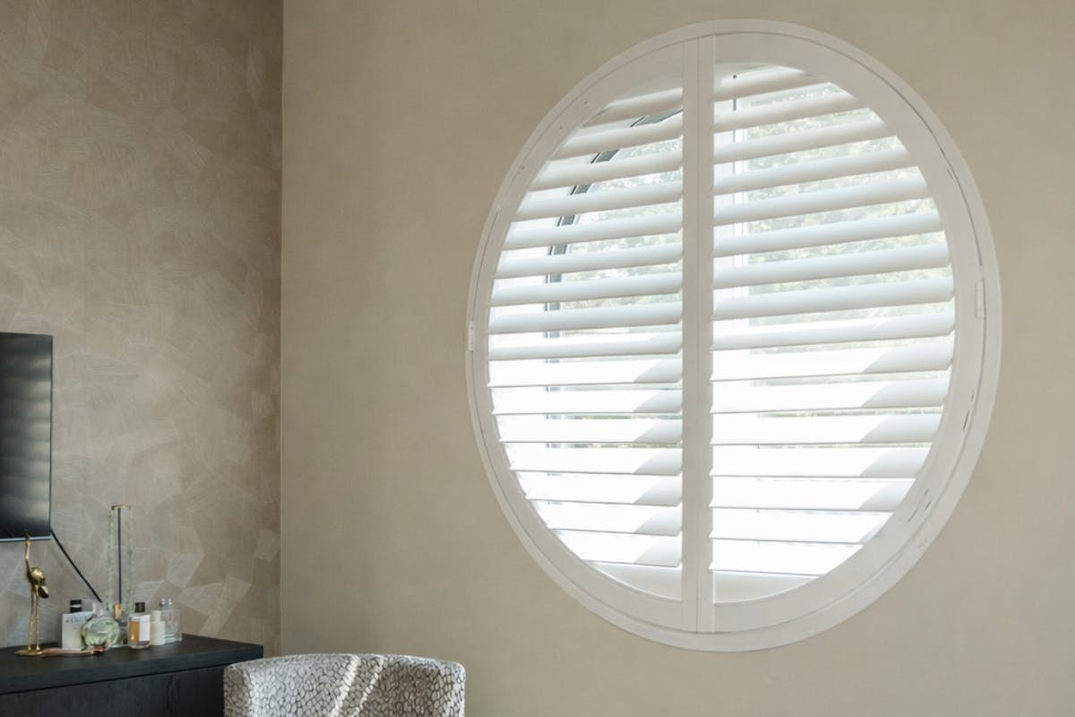Shutters ronde ramen